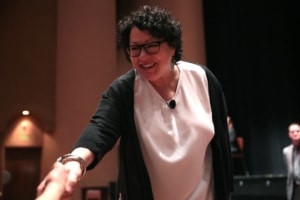 Sonia Sotomayor shaking hands with audience